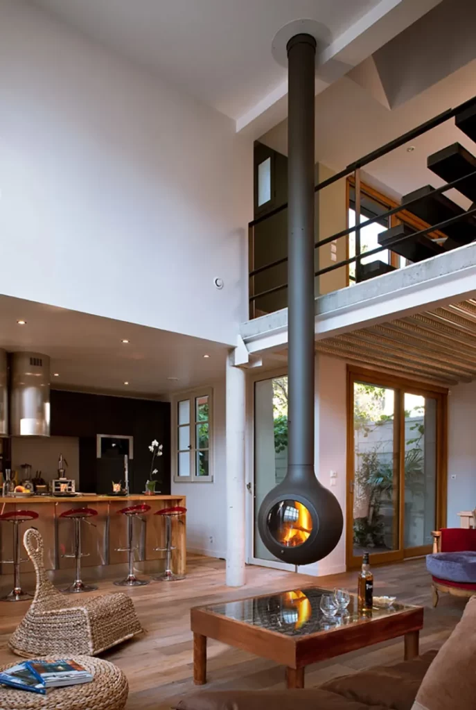 Nothing better than cuddling up with a blanket next to a crackling fire on a cold evening. Here are 23 most innovative and creative fireplace design ideas...