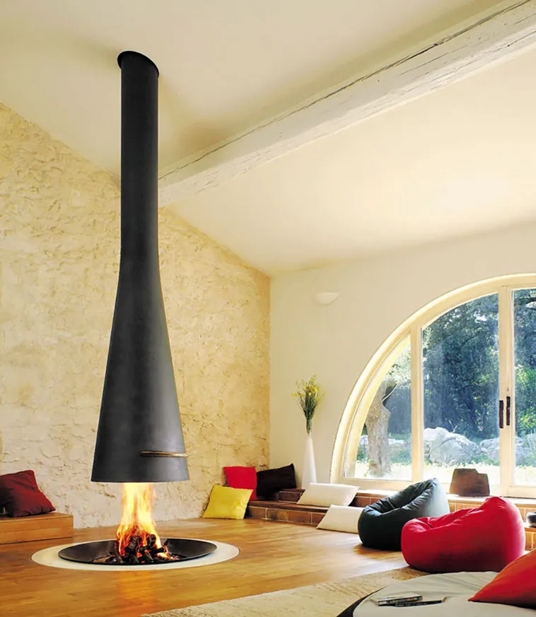 Nothing better than cuddling up with a blanket next to a crackling fire on a cold evening. Here are 23 most innovative and creative fireplace design ideas...