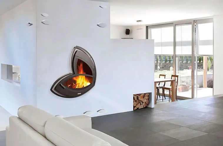 Nothing better than cuddling up with a blanket next to a crackling fire on a cold evening. Here are 23 most innovative and creative fireplace design ideas...