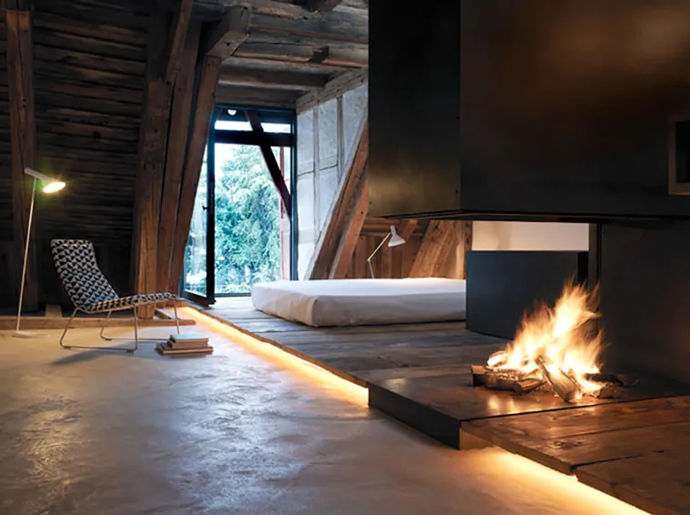 Nothing better than cuddling up with a blanket next to a crackling fire on a cold evening. Here are 23 most innovative and creative fireplace design ideas...