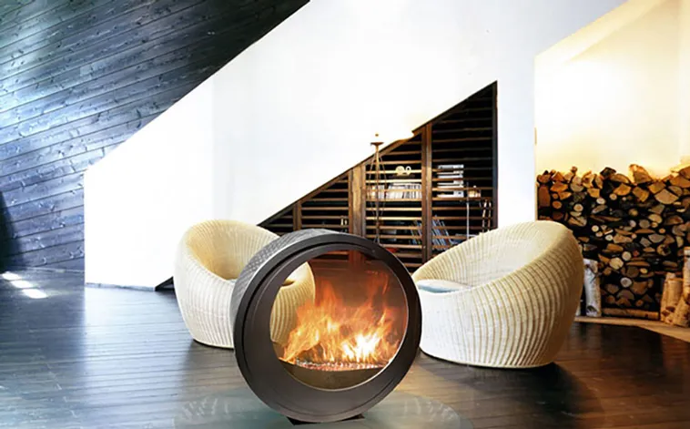 Nothing better than cuddling up with a blanket next to a crackling fire on a cold evening. Here are 23 most innovative and creative fireplace design ideas...