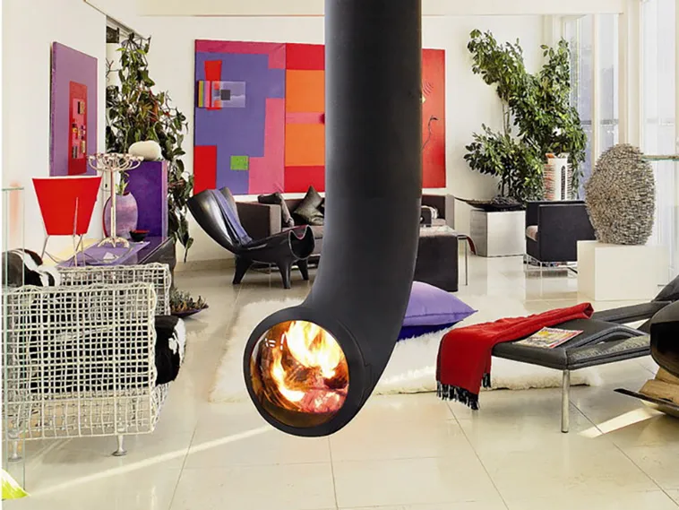 Nothing better than cuddling up with a blanket next to a crackling fire on a cold evening. Here are 23 most innovative and creative fireplace design ideas...