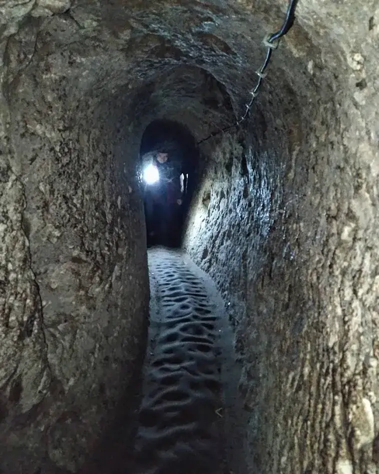 Explore the mysteries of Derinkuyu, the largest underground city housing 20,000 people. Delve into its rich history and ingenious design. Unearth a hidden world beneath Cappadocia's enchanting landscape.