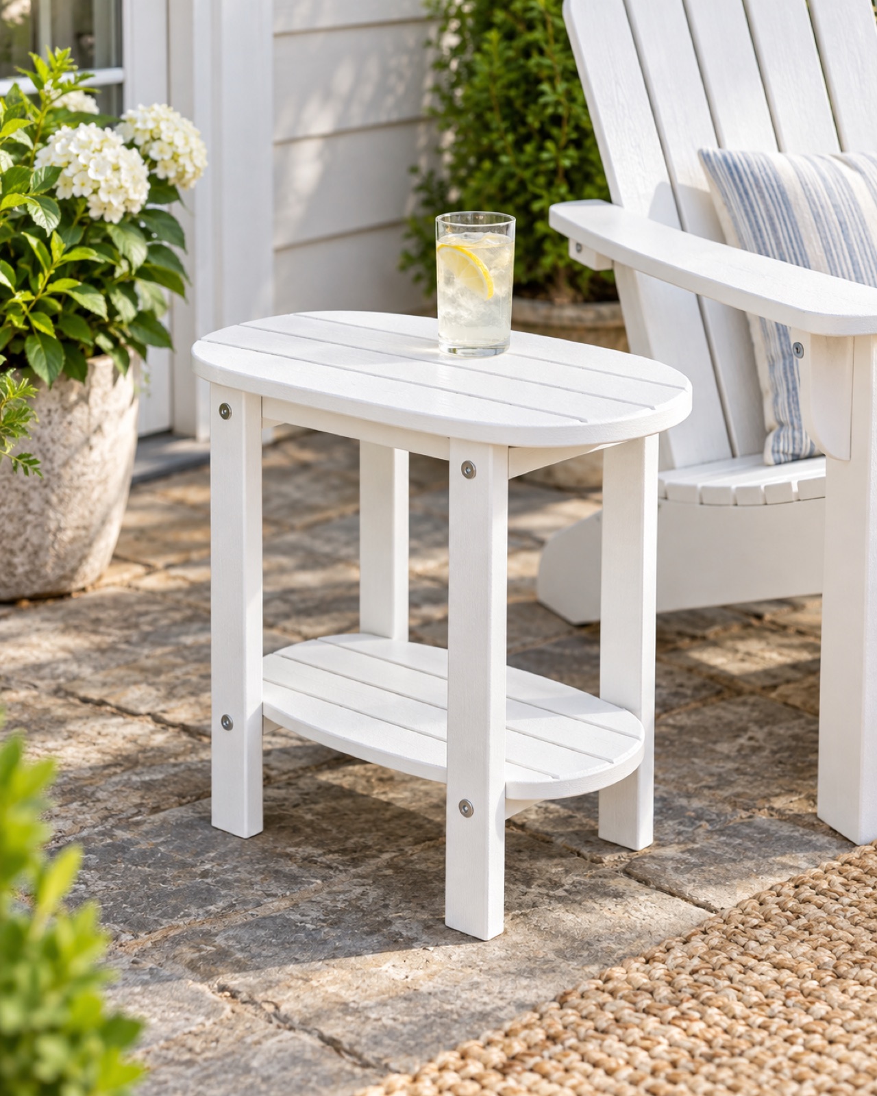 12 Compact Outdoor Side Tables for Small Patios and Balconies AI-generated visualization approximating the white oval GARDENSTAR two-tier outdoor side table