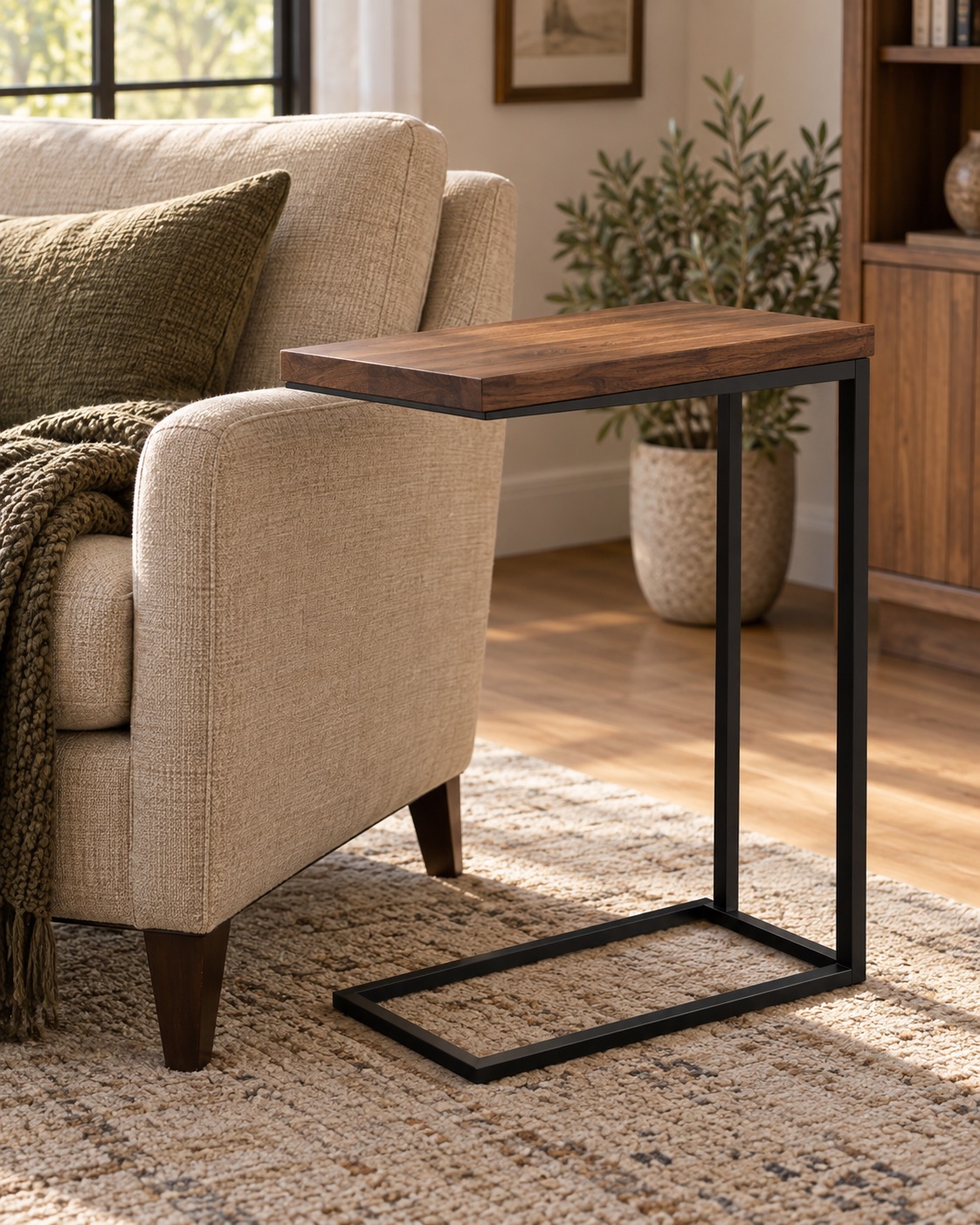 AI-generated visualization approximating the SIMPLIHOME Skyler solid mango wood C-side table beside a sofa