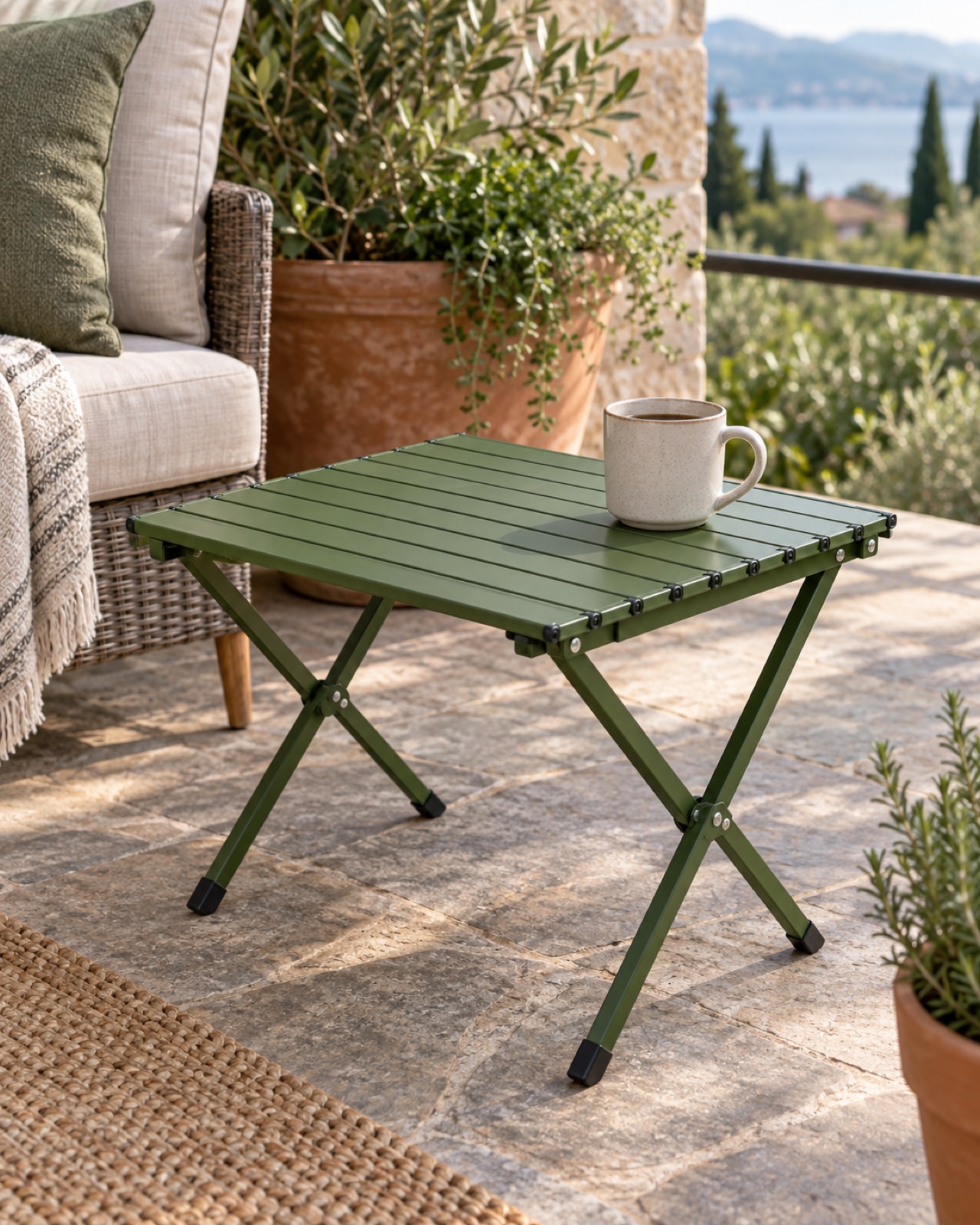 12 Compact Outdoor Side Tables for Small Patios and Balconies AI-generated visualization approximating the green VILLEY small aluminum camping side table