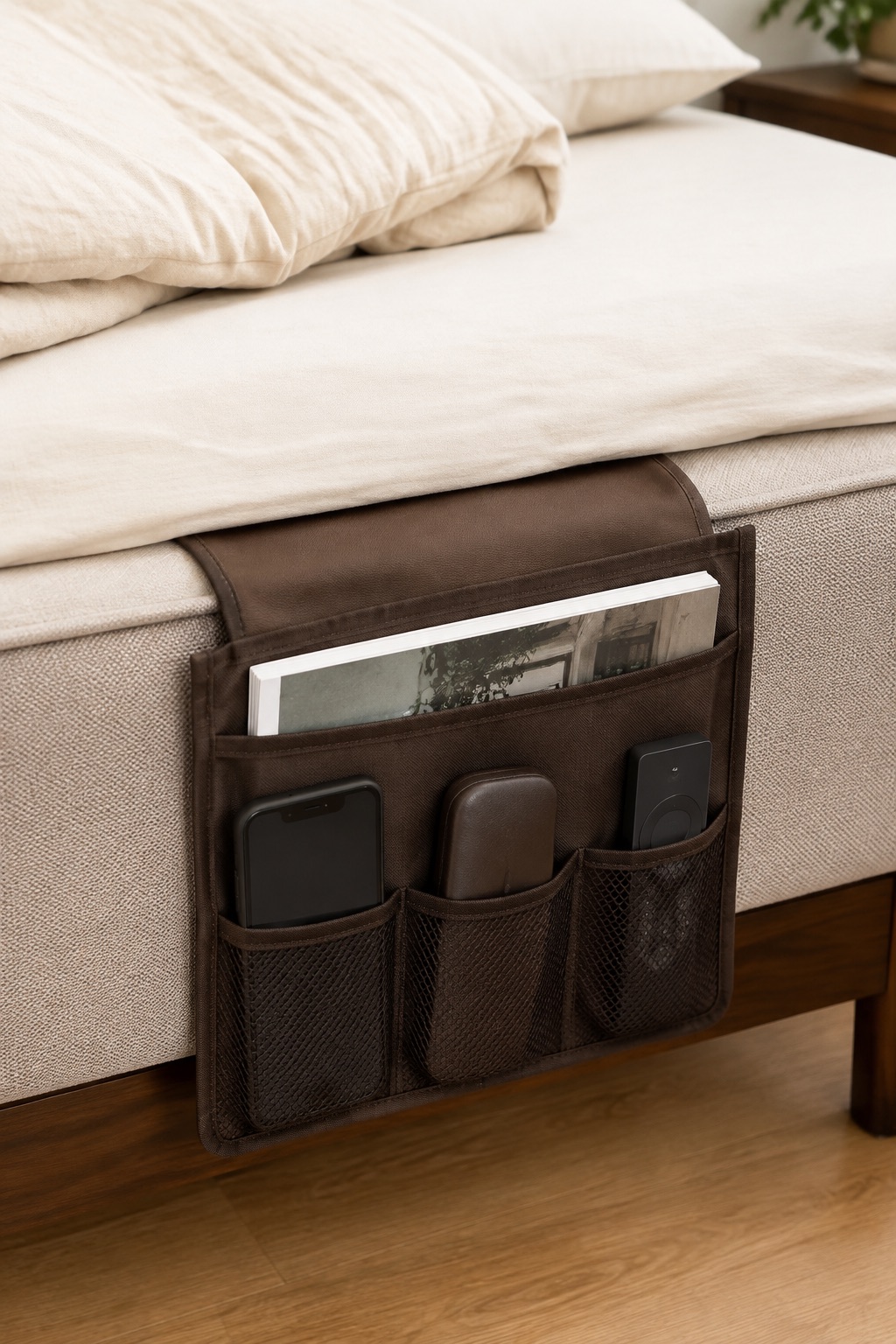 AI-generated visualization approximating the design of the Zafit Classic Four-Pocket Bedside Organizer, Coffee beside a bed.