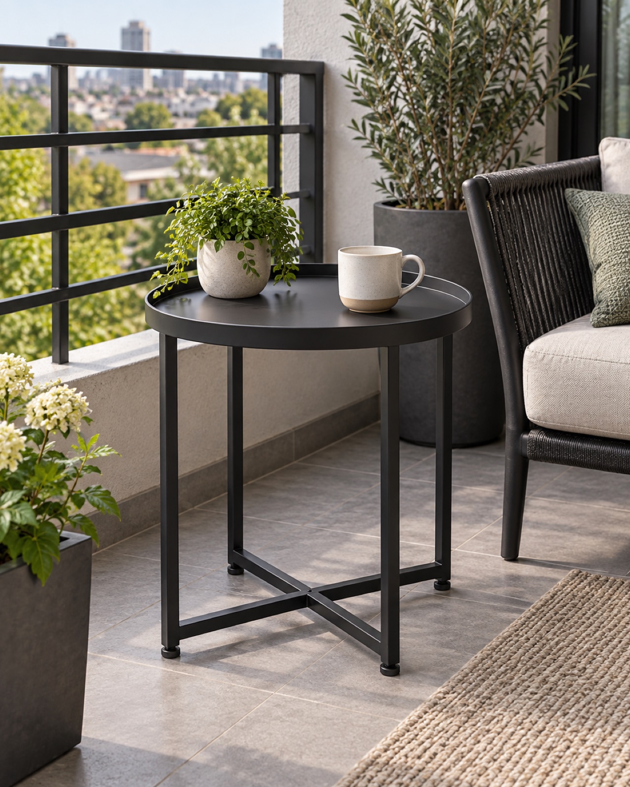 12 Compact Outdoor Side Tables for Small Patios and Balconies AI-generated visualization approximating the black Meluvici round steel outdoor side table