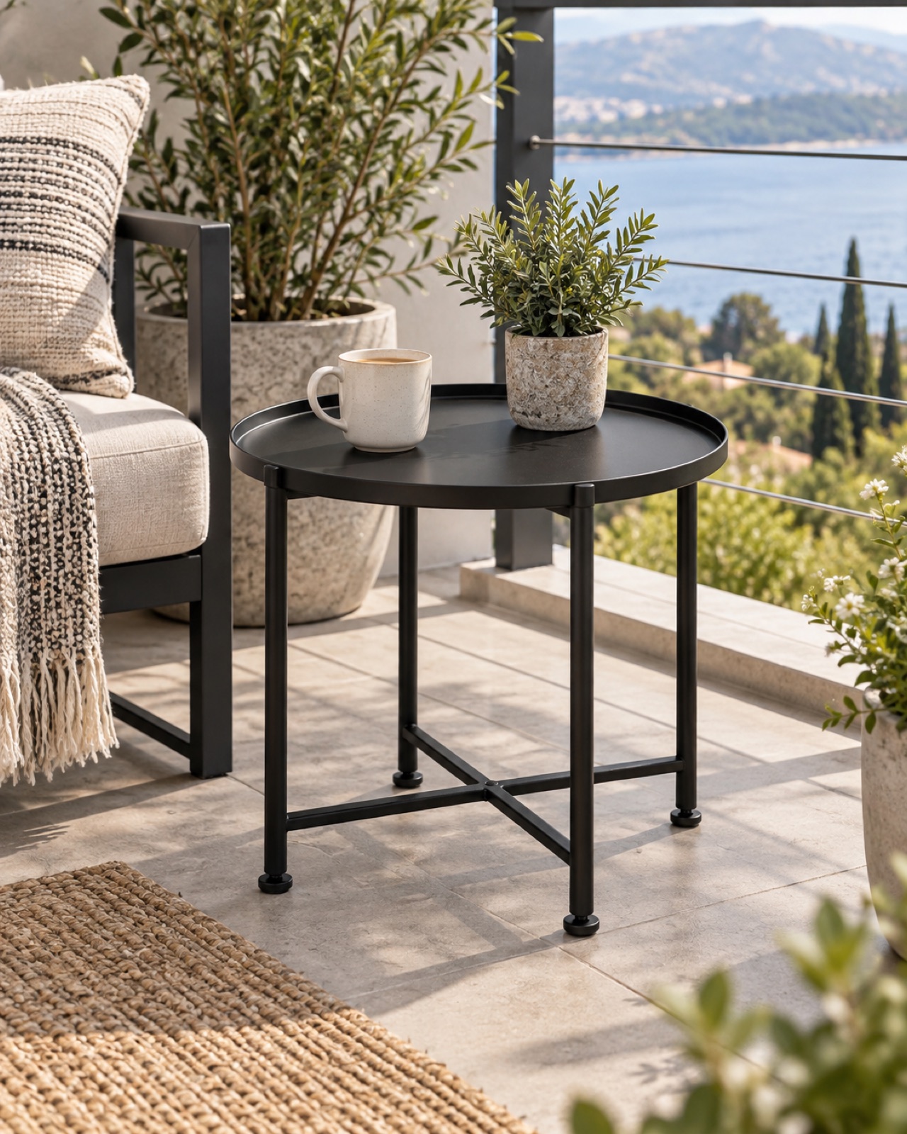 12 Compact Outdoor Side Tables for Small Patios and Balconies AI-generated visualization approximating the black danpinera round steel outdoor side table