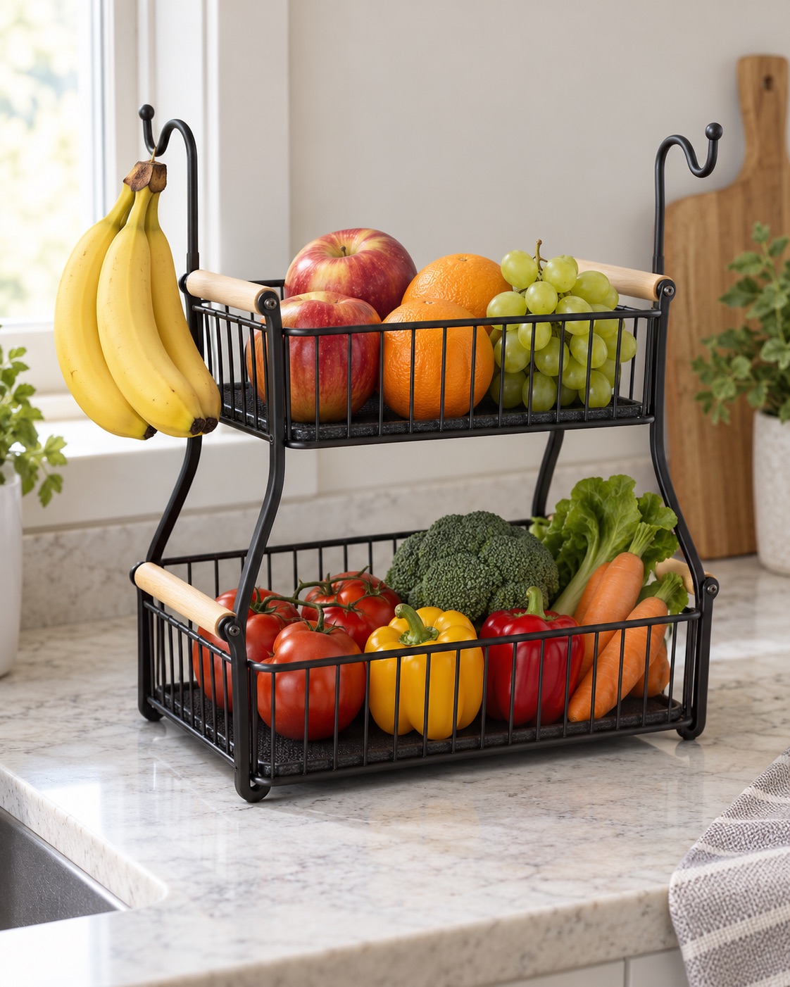 Two-tier black wire produce basket with wooden handles and banana hooks